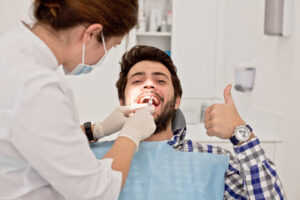 man smiling at adult dentist appointment in Torrance